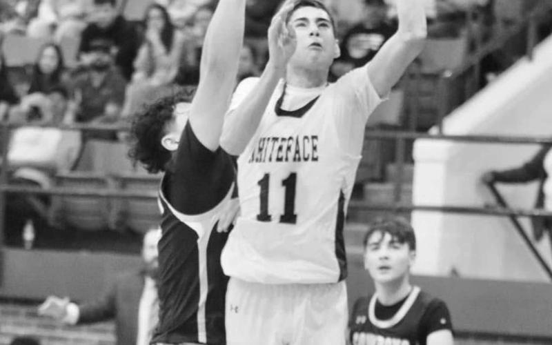 FOCUSED - Whiteface Antelope Cesar Chavez layed the ball up through contact last Friday night during the team’s game against Plains at home. (Photo courtesy of Holly Crutcher)
