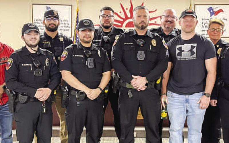 RANK PROMOTION- Levelland PD’s Sgt. Benoit (pictured in the middle) was promoted to sergeant during Monday’s Levelland City Council meeting.Photo courtesy of the LPD)
