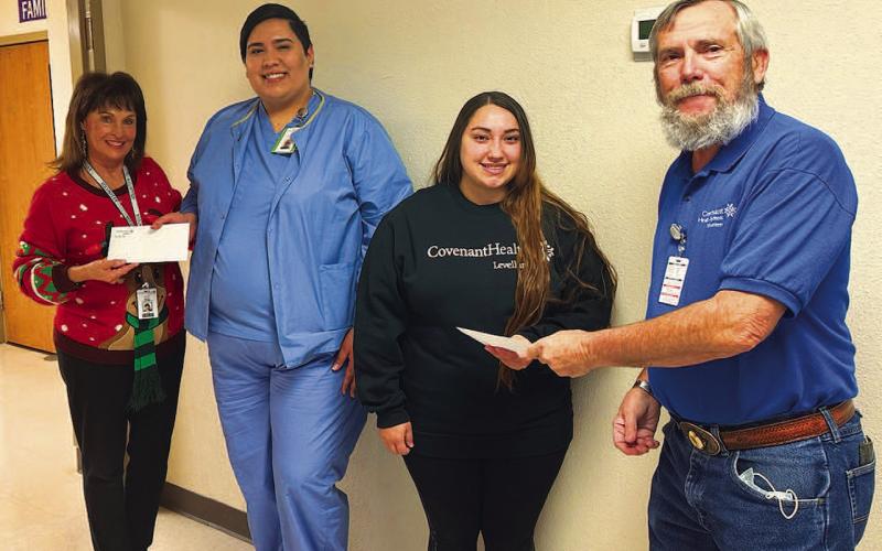 SCHOLARSHIP RECIPIENTS - Since the beginning of the Sugar Plum Gift Shop located in the Covenant Health of Levelland, the volunteer group along side the board have provided scholarship opportunities to students continuing their college education. Pictured on the far left is Treasurer Joan Sanders awarding Aaron Martinez with a scholarship and on the far left, President Dean Sanders presenting Hannah Hinojosa with her scholarship. (Photo courtesy of Norma Rubalcava)