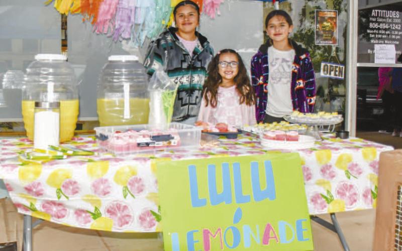 - Pictured from left to right are: Joscelhen Marrufo, Ixtli Sanchez and Jazmin Maruffo who enjoyed serving fresh lemonade for Lemonade Day on Saturday in downtown Levelland. (Staff photo by Hannah Woodrum)