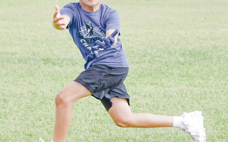 ROUTE RUNNING - Antelope camper Alexander Campos runs a route and catches the football during a route running drill at the Whiteface Sports Skills Camp this past Wednesday at Whiteface High School. (Staff photo by Jentezen Smith)