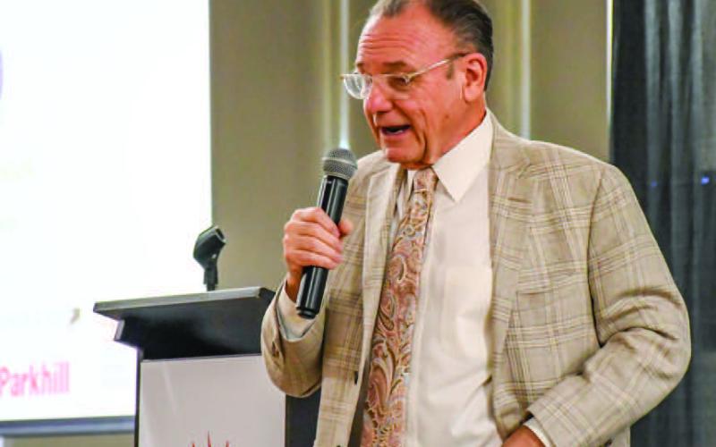 PROVIDING INSIGHT - During the Levelland Economic Development Corporation (LEDC) luncheon on Thursday, Dr. Ray Perryman spoke on the current economy, as well as the energy industry, on local, state and national levels. The event was held at the Mallet Event Center and Arena. (Staff photo by Evin Thomas)