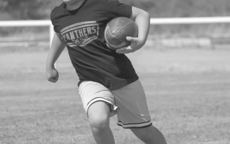 SPEED - Whitharral Panther Virion carried the ball during running back drills at the Whitharral All-Sports Camp this past Monday. (Staff photo by Aalijah Soliz)