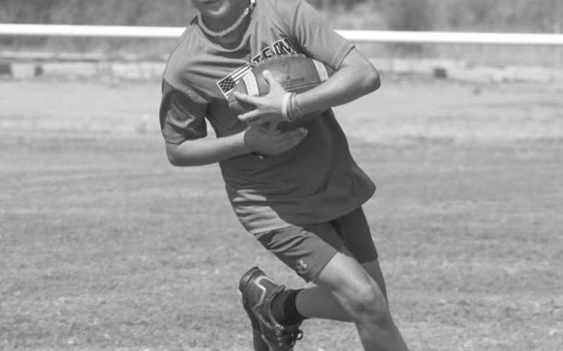 QUICK TURNING - Whitharral Panther Korbin Edwards carried the football during running back drills at the Whitharral All-Sports Camp this past Monday at the Football Field. (Staff photo by Aalijah Soliz)