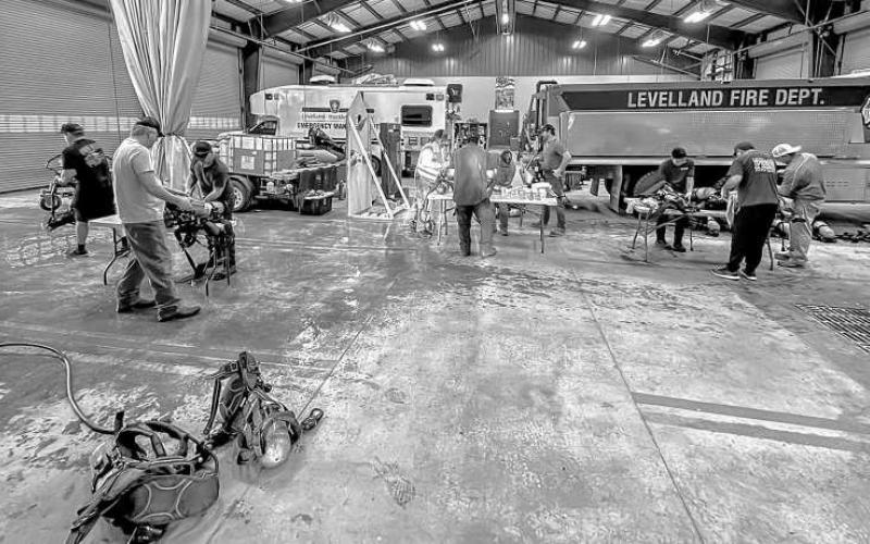 PREVENTATIVE MAINTENANCE - The LFD (Levelland Fire Department) scheduled a mandatory cleaning detail Monday evening to ensure air packs were thoroughly decontaminated. It was stated the cleaning is essential in light of the department's response to multiple fires during the past few weeks. (Photo courtesy of the LFD)