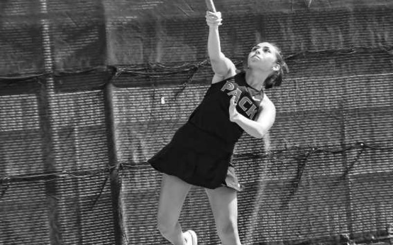 WATCH IT GO – Kimberly Campos serves the ball and watches its trajectory during a mixed double’s matchup against Big Spring at the Levelland Tennis Courts on August 2. (Staff photo by Jentezen Smith)
