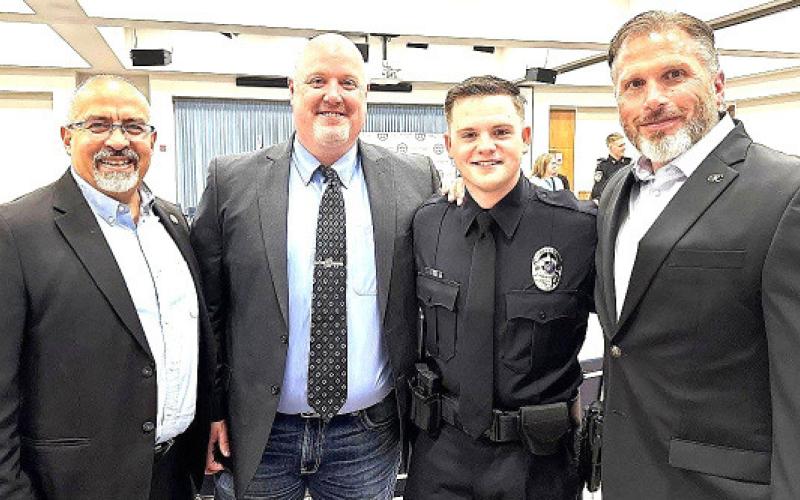 Logan Bartlett is a 2026 graduate of South Plains College’s Law Enforcement Academy. Shown are (left to right) SPC Technical Education Dean Albert Garcia, Law Enforcement Instructor Shawn Wilson, Bartlett and SPC Professional Services and Energy Department Chair Kenny Burns. (photo courtesy of South Plains College)