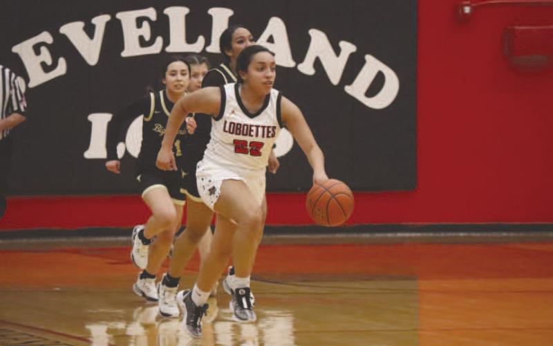SPEED - Levelland Loboette Olivia Velardez grabbed the rebound and ran for the teams fastbreak against the Big Spring Lady Steers this past Friday at home for their district opener. (Staff photo by Aalijah Soliz)