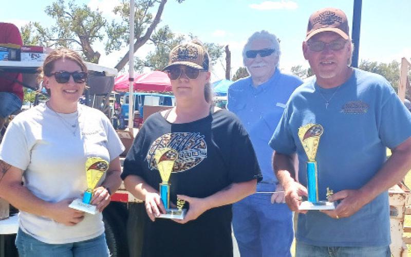STOCK MOTORCYCLE – Jacie Anstead, third place with a black and grey 2023 Harley Davidson Breakout; Christina Johnson, second place for a red and black Harley Softail; and Kelly Dunn, first place with a yellow 2022 Harley Streetglide. (Staff photo)