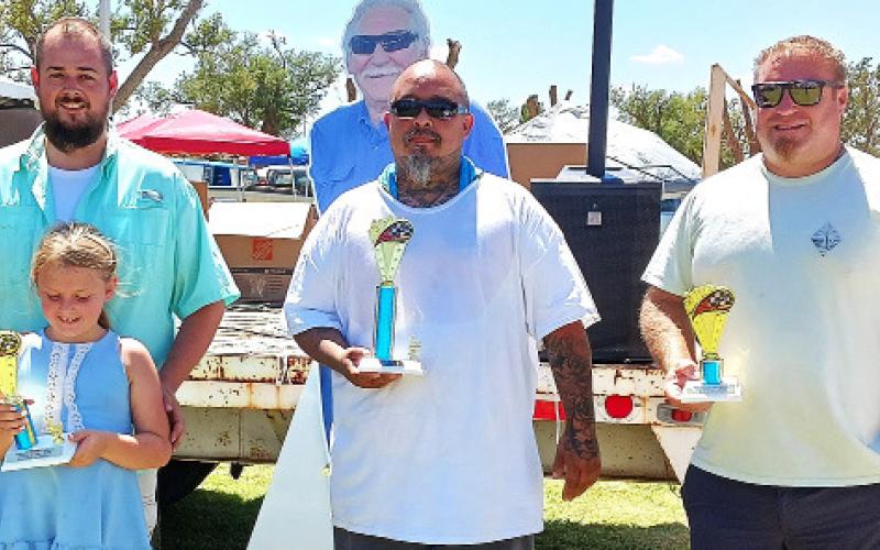 GENERIC CLASS – Chevy and Chevelle Fry, second place with a blue 1967 Chevy G-10; Emilio Sanchez, first place for a black and white 1970 Schwinn; and Zack Monery, third place with a copper brown 1981 Jeep Scrambler.