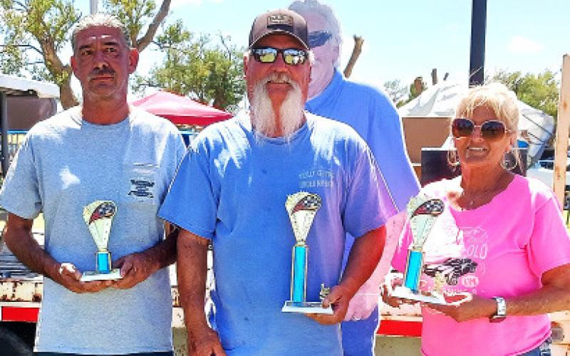 CUSTOM/MODIFIED (74 older) – Jerry Gonzales, third place with a turquoise 1968 Chevy C-10; Billy Roberts, first place for an orange and white 1935 Dodge; and Venus Holmes, second for a white 1962 Chevy Impala.