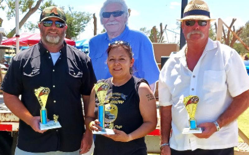 CUSTOM TRUCKS ’90-OLDER – Ben Lewis, second place with a blue 1967 Ford; Frank Rodriguez, first place for a 1972 Chevy C10; and Jody Heath, third place with a blue 1984 GMC 1500. (Staff photo)