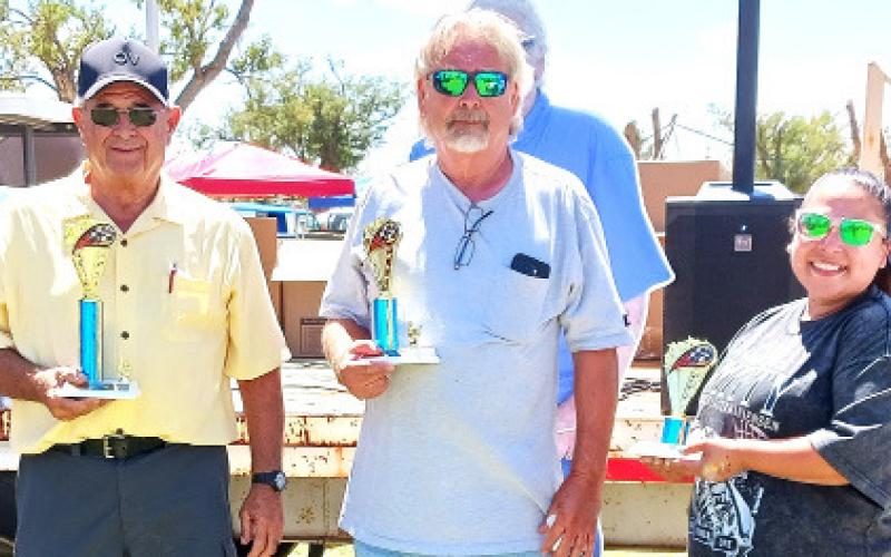 PRO STREET – Allen Butler, first place for a 1955 Chevy Bel Air; Jack Hunt, second place with a pearl white 1946 Ford Business Coupe; and Samantha Frey, third place for a brown 1949 GMC truck. (Staff photo)