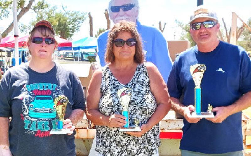 ORIGINAL TRUCKS (All Years) – Tiffany Cosh, third place for a yellow and white 1981 Chevy pickup; Marilyn Valencia, second place along with David Valencia for a yellow and white 1972 Chevy truck; and Troy Bass, first place with a black 1979 Chevy C10.