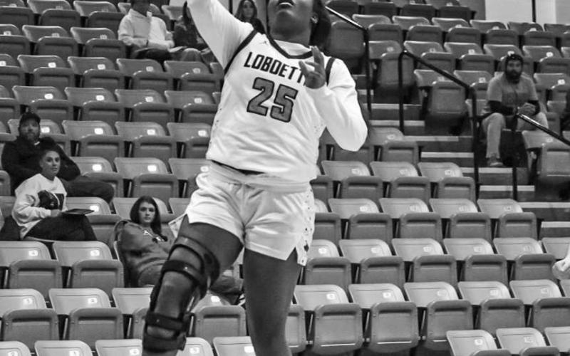 FASTBREAK - Levelland Loboette Destynii Jones layed the ball up during the team’s fast break during the Andrews Tournament last week. (Staff photo by Aalijah Soliz)