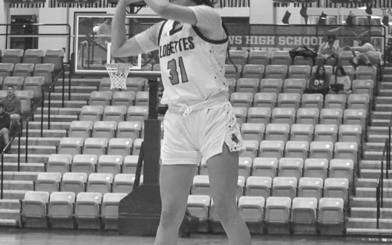 LONG RANGE - Levelland Loboette Leilani Sanchez shot the ball from long range during the team’s game in the Andrew’s Tournament. (Staff photo by Aalijah Soliz)