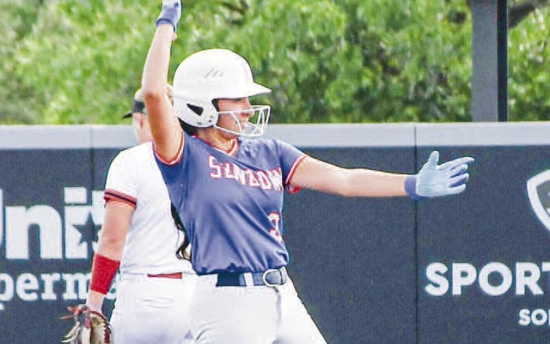 POST-HIT CELEBRATION - Sundown Roughette Destiny Garza celebrates a double on second base during the State Semifinals at Abilene Christian University recently. (Staff photo by Jentezen Smith)