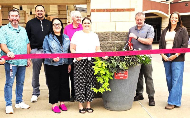 Noon Rotary Club — sponsoring two planters at LMS. (front, left to right) Angie Covarrubias, Brad Brunson, Janie Mireles, Mandy Leach, Rob Haney, Amber Wisdom, Mary Siders, (back) Dr. Don Heseman and Phelps Bloom.