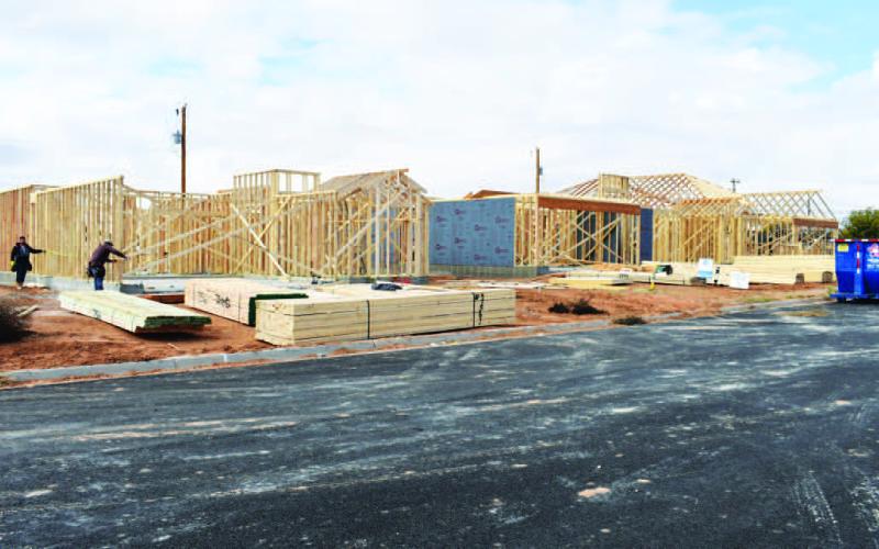 CONTINUING TO GROW - Residential and commercial permits are continuing to be issued as residents throughout Levelland and businesses are renovating and upgrading properties. Pictured are a handful of houses that are in the framing process in the area of Holly Street and Joliet Avenue near the Levelland High School. (Staff Photo by DeeLaine Ruiz)