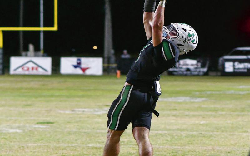 GET UP FOR IT - Ropes junior wide receiver Kolter Dockery jumps up to catch the football during a game against Sundown this past Friday night at Ropes Eagle Stadium. Dockery would end with two catches for 40 yards. (Staff photo by Jentezen Smith)