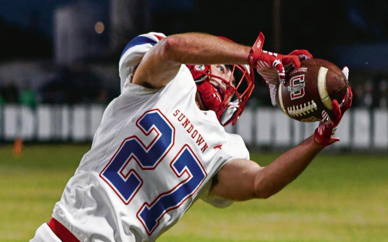 SPECTACULAR CATCH - Sundown senior wide receiver Nathan McAdams makes a spectacular catch for a 36-yard gain during a game against Ropes this past Friday night. Ropes would win 54-8. (Staff photo by Jentezen Smith
