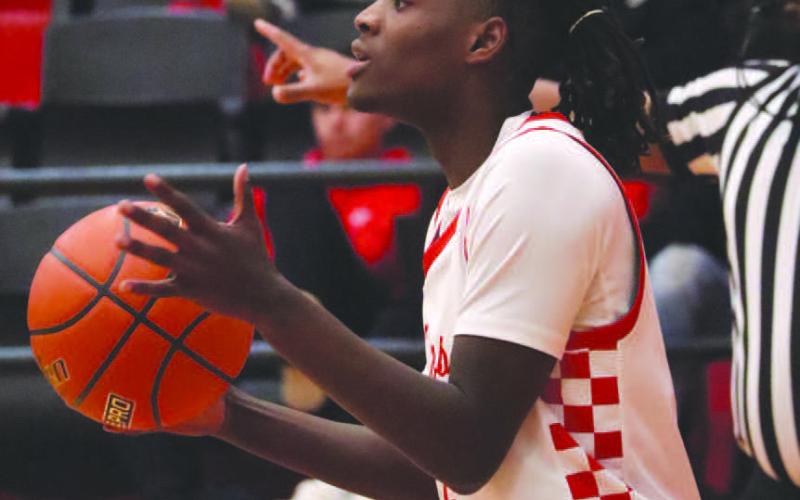 Levelland Lobo Elijah Jordan inbounded the ball during the teams contest against the Brownfield Cubs last Tuesday. (Staff photo by Aalijah Soliz)