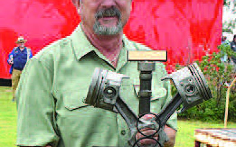 BEST ENGINE– John Agnew of Levelland won the Best Engine award at the annual Thunder on the Plains Car Show Saturday in City Park. Agnew received the award for his 1968 Chevy Camaro. (Staff Photo)