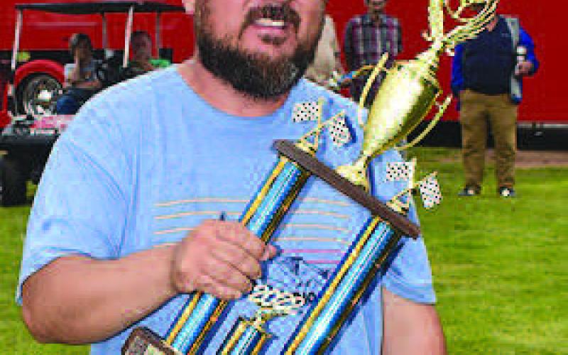 PEOPLE’S CHOICE-- Jose Marrufu won the People’s Choice award at the Thunder on the Plains Car Show Saturday. The People’s Choice was Marrufu’s 2009 Ford F-250. (Staff Photo)