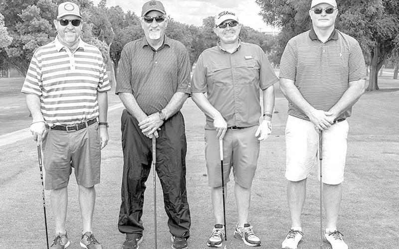 FLIGHT ONE THIRD PLACE- The South Plains Electric Co-Op team captured third place in the SPC Scholarship Scramble. Shown from L-R are: Dale Ancell, Randal Bailey, Ben Greene and Shane Adams. (Photo by R&amp;amp;P Photographers)