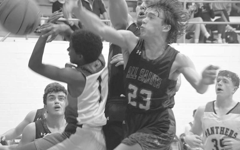 BLOCK- The Whitharral Panthers dropped a close 42-41 game to the All Saints Patriots in the championship round of the Whitharral Invitational Basketball Tournament on Saturday. The Panthers will be in Lorenzo on Friday for a 3:15 p.m. game. (Photo Courtesy of Jay Kelley)