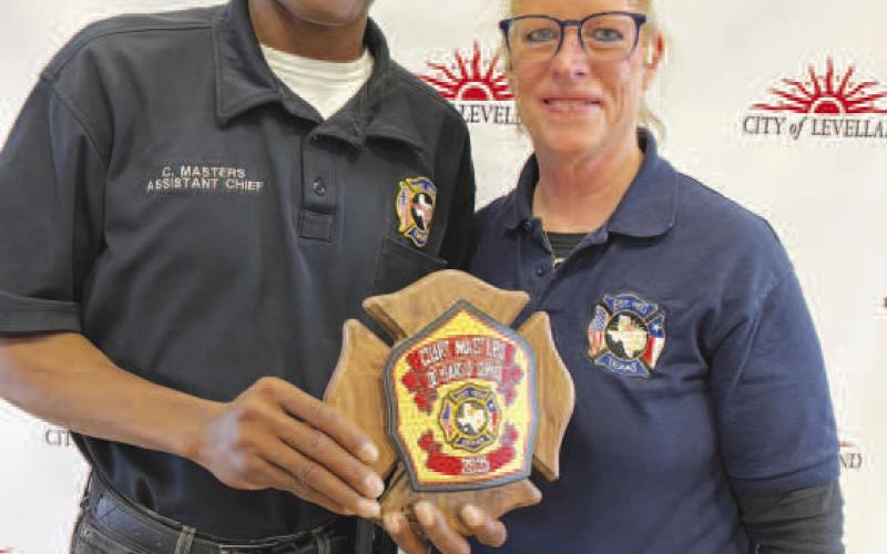 JOB WELL DONE - The LFD held an awards banquet on Saturday with Curt Masters (left) being honored for his 30 years of service. Pictured alongside Masters is Interim Fire Chief Patty Byars-Faulkner. (Photo courtesy of the LFD)