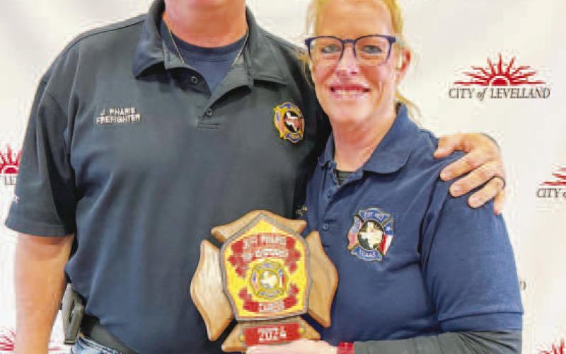 PROUD TO SERVE - Jeff Pharis (left) was awarded the Career - Top Responder of the Year Award on Saturday during the LFD awards banquet. Pictured alongside Pharis is Interim Fire Chief Patty Byars-Faulkner. (Photo courtesy of the LFD) (Photo courtesy of the LFD)