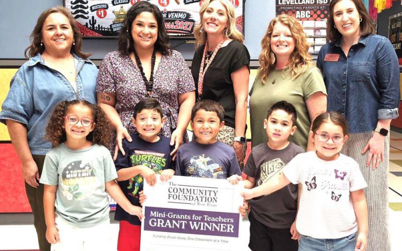 COMMUNITY FOUNDATION OFWEST TEXAS GRANT - LABC | Briana Robinson — Tools for Success. Robinson's grant will provide tools and resources designed to help our youngest Lobos build important skills through hands-on learning, giving them a strong foundation for future success. Shown are representative, Briana Robinson, principal Ashley Howard, assistant principal Amy Pebsworth and Ameliah Moody, Nicholas Aguilar, Jayden Hernandez, Ezra Osornio, and Daniella Leal.
