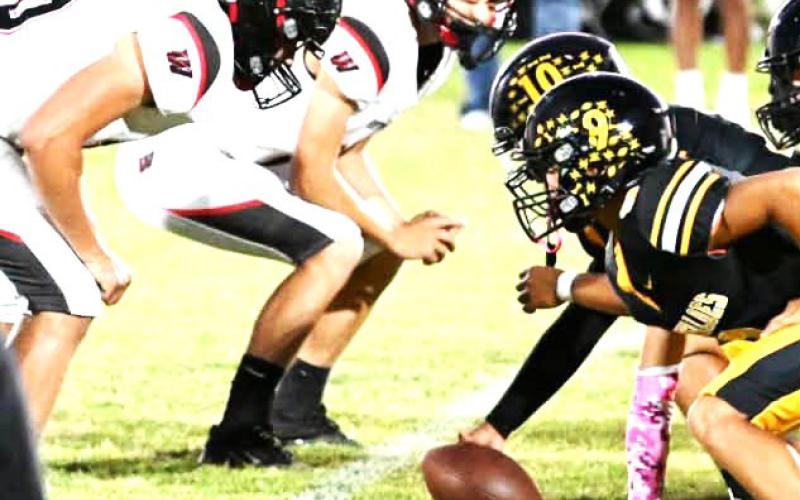 Whitharral Panthers defense sets up for Petersburg hike.