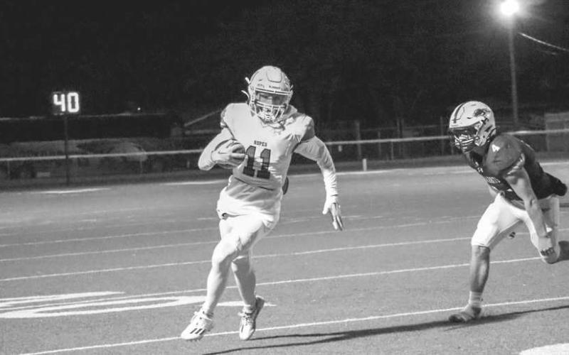CANT CATCH ME - Ropes wide receiver Reese Williams outran Jackrabbit defenders in the teams playoff loss in Abernathy last Thursday night. (Staff photo by Aalijah Soliz)