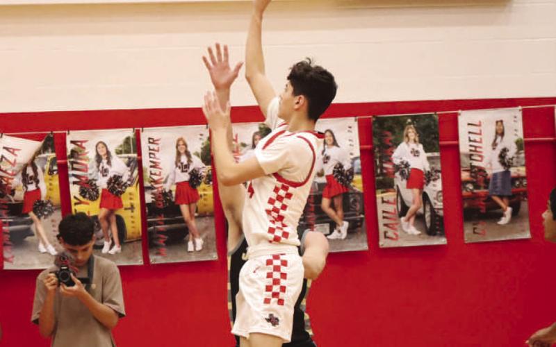 Levelland Lobo Anthony Gonzales shot the ball during the teams game against the Jayton Jaybirds for some much needed points. (Staff photo by Aalijah Soliz)
