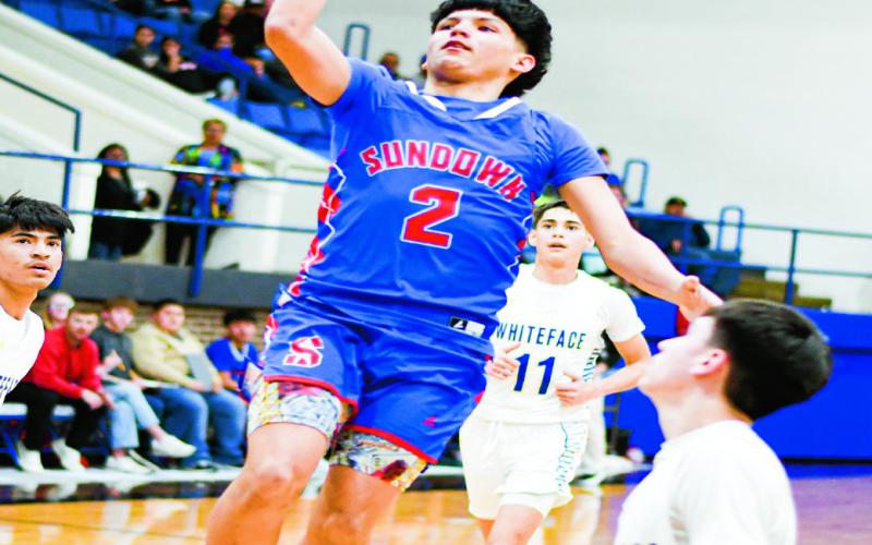 FLOATER GAME - Sundown's Marco Landa shoots a floater this past Tuesday at Whiteface High School.