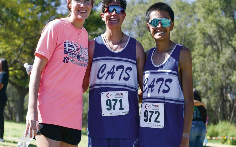 BOBCAT XC AT REGIONALS - The Smyer Bobcats regional qualifiers competed in the 2A Region 1 Cross Country Championship this past Tuesday at Mae Simmons Park. Pictured from left to right is Head Coach Shelby Binion, senior Austin Martinez and senior Ismael Pizano. (Staff photo by Jentezen Smith)