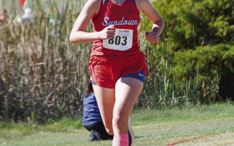 STATE QUALIFIER - Sundown junior Kaytlin Clausen finished sixth in the 2A Region 1 girl’s two-mile race with a time of 12:46.10 to earn an individual qualifier bid for the state meet this past Tuesday at Mae Simmons Park. (Staff photo by Jentezen Smith)