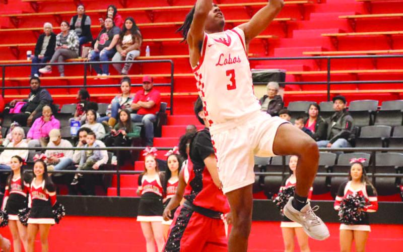 Levelland Lobo Eryk Jones went for the dunk during the teams contest against the Brownfield Cubs this past week. (Staff photo by Aalijah Soliz)