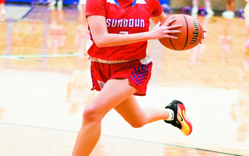 FASTBREAK GATHER - Sundown’s Avyian McGlasson gathers her dribble on the fastbreak during their game against Whiteface this past Tuesday night at Whiteface High School. (Staff photo by Jentezen Smith)