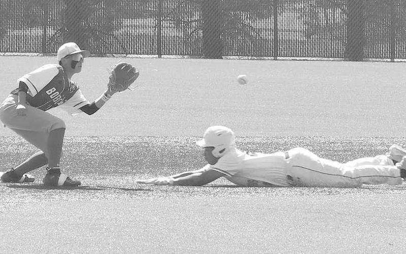 CAUGHT STEALING- Olton’s Fabian Gutierrez tried to beat the ball to Smyer Bobcat Austin Martinez waiting at second base in a steal attempt Friday in the second game of the UIL Class 2A High School Baseball Bi-District Playoff. Gutierrez didn’t beat the ball, but the Mustangs downed the Bobcats 11-10 and 6-4. (Photo Courtesy of Jay Kelley)