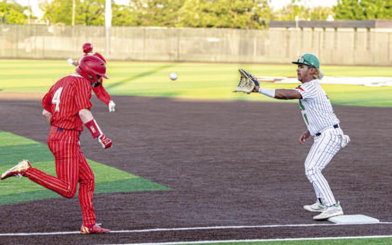 ROUTINE PLAYTO FIRST - The Ropes Eagles were crowned Area Champions last weekend after defeating the West Texas Comanches in a best of three sweep. The Eagles held off the Comanches with a 3-0 win. Pictured is Eagle first baseman Elijah Flores catching a routine throw to first to get a Comanche out during game two of the series..(Photo courtesy of Donovan Martin)