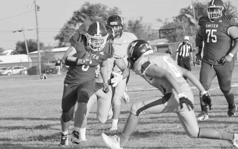 Smyer running back broke loose on a run play to gain some good yards in the Bobcats win last Friday against the Crosbyton Chiefs. The Smyer Bobcats play this upcoming Friday against Ralls as the away team. (Staff photo by Aalijah Soliz)