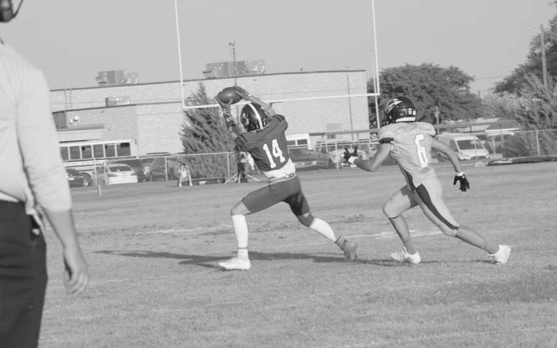 FOCUSED CATCH - Smyer wide receiver made the good catch in their win against the Crosbyton Chiefs to get his team a first down. The Bobcats will travel to Ralls this upcoming Friday to get their second game of the season started. (Staff photo by Aalijah Soliz)
