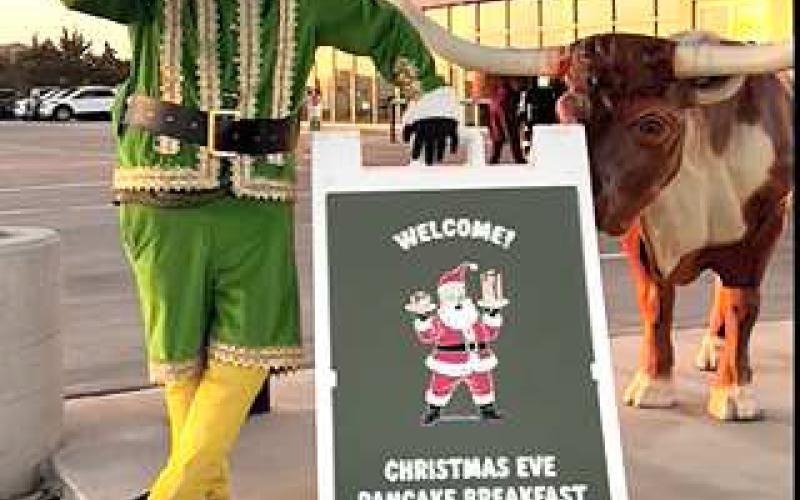 ELF’S WELCOME- One of Santa’s elves welcomed the community to Smith Auto Family’s 26th annual pancake breakfast this past Wednesday. (Smith Auto Family Levelland photo)