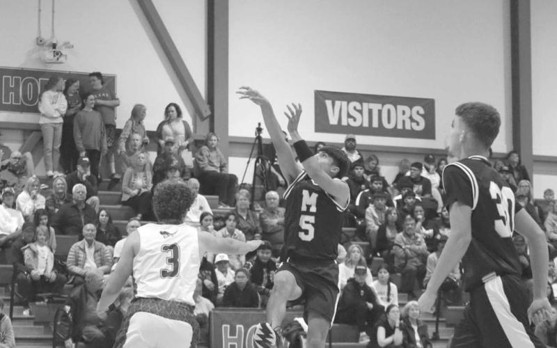 FADEAWAY - Morton Indian Alex Lopez shot a contested fade away during the teams contest this past Monday night in the teams loss to All-Saint. (Staff photo by Aalijah Soliz)