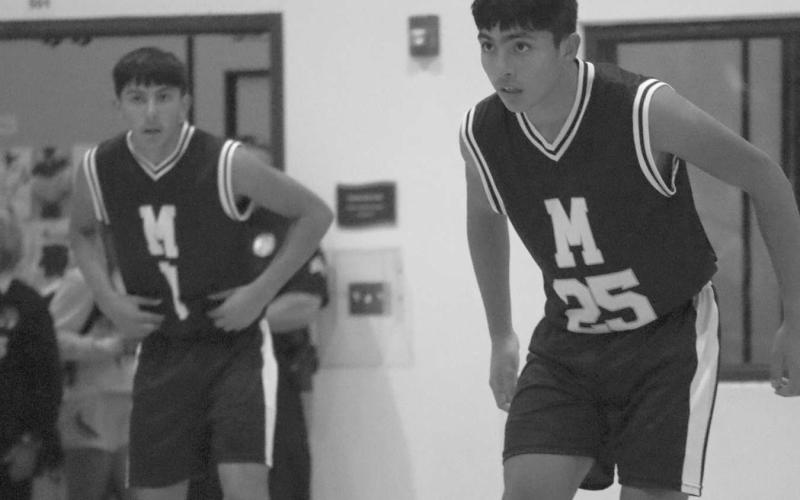 LOCKED IN - Morton players were locked in on defense during the teams game aginst the All-Saint Patriots last Monday before the schools Thanksgiving break. (Staff photo by Aalijah Soliz)
