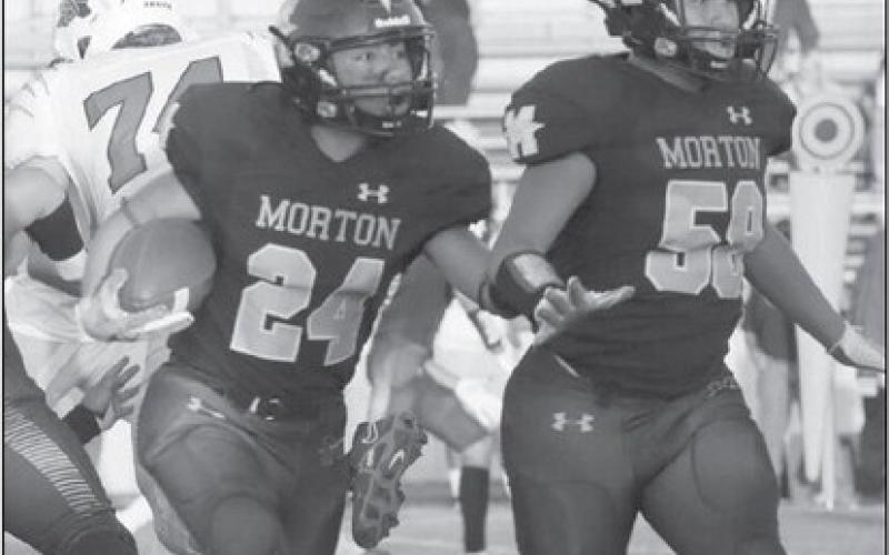 POWER SWEEP - Morton athlete Christain Enriquez had a good run last Friday during the teams homecoming game. (Staff photo by Aalijah Soliz)