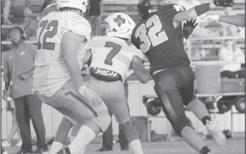 IN THE BACKFIELD - Morton athlete Christain Enriquez made it past Boys Ranch offensive line to get the sack on the quarterback during their homecoming game last Friday. (Staff photo by Aalijah Soliz)